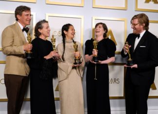 Producers Peter Spears (from left), Frances McDormand, Chloe Zhao, Mollye Asher and Dan Janvey, winners of the award for best picture for "Nomadland" at the Oscars 93rd Annual Academy Awards