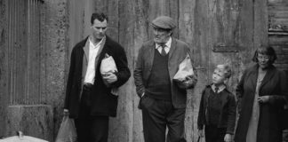 Ciarán Hinds, Jude Hill, and Jamie Dornan in "Belfast"