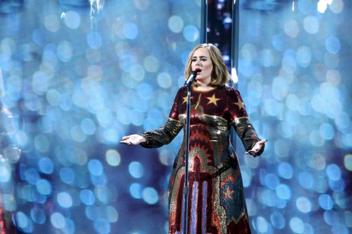 Adele performs at the 2016 Brit Awards.