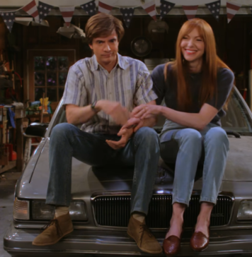 Topher Grace and Laura Prepon in "That '90s Show"