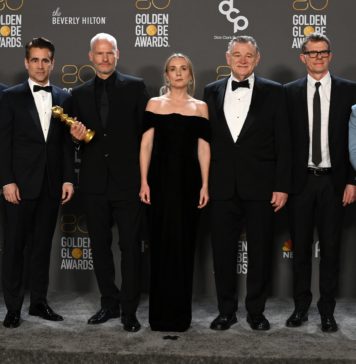 Peter Czernin, Colin Farrell, Martin McDonagh, Kerry Condon, Brendan Gleeson, Graham Broadbent, and Barry Keoghan with the award for Best Film, Musical or Comedy: "The Banshees of Inisherin" at the 80th Annual Golden Globe Awards