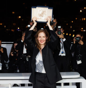 Justine Triet poses with The Palme D'Or Award for "Anatomy of a Fall" during the Palme D'Or winners photocall at the 76th annual Cannes film festival in May 2023
