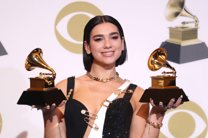 Dua Lipa with her Grammy awards for Best New Artist, Best Dance Recording