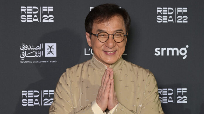 Jackie Chan poses on the Red Carpet during the closing ceremony of the second edition of the Red Sea International Film Festival in 2022