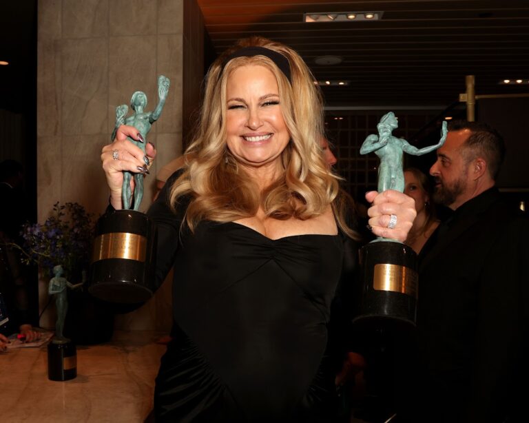 Jennifer Coolidge with her awards for Female Actor in a Drama Series, 