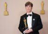 Cillian Murphy of "Oppenheimer" celebrates backstage with his Best Actor Oscar in March 2024