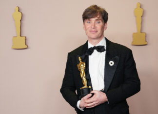 Cillian Murphy of "Oppenheimer" celebrates backstage with his Best Actor Oscar in March 2024
