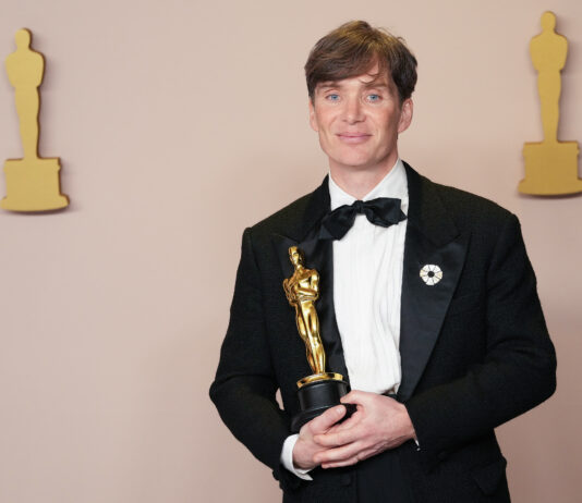 Cillian Murphy of "Oppenheimer" celebrates backstage with his Best Actor Oscar in March 2024